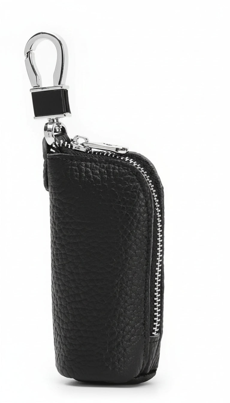 Black leather key pouch with a zipper on a white background