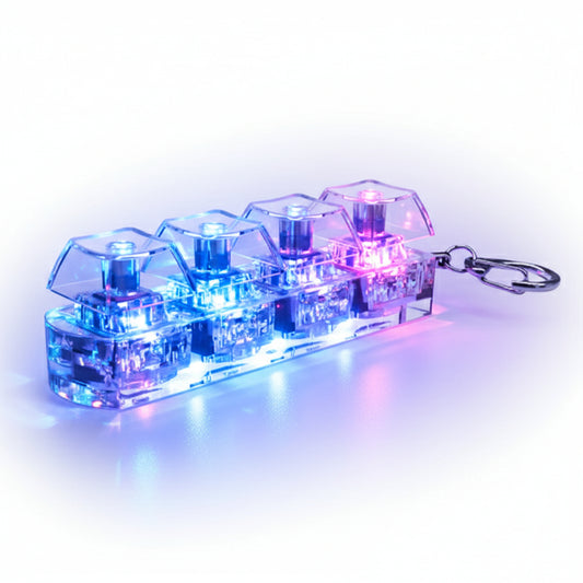 Clear cube-shaped keychain with a metal clip on a white background